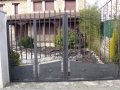 Puerta dos hojas con peatonal C. Rural.JPG